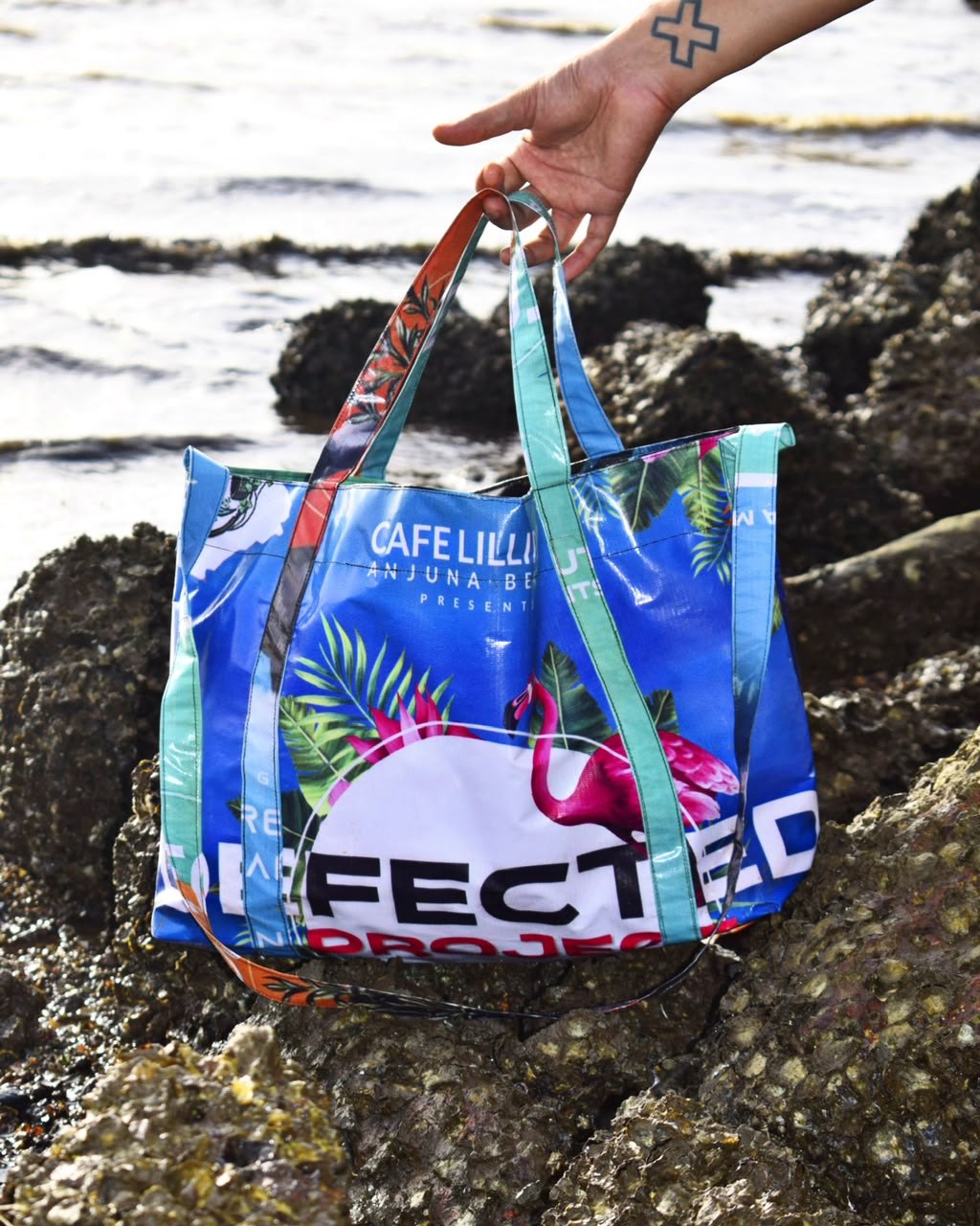 Flamingo Tote, held up on the rocks